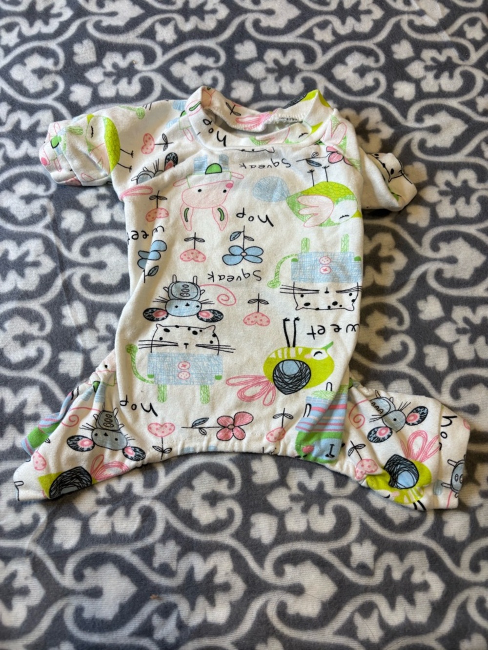 Onesie Pajamas for Small Dog. The item is size large but fits small.